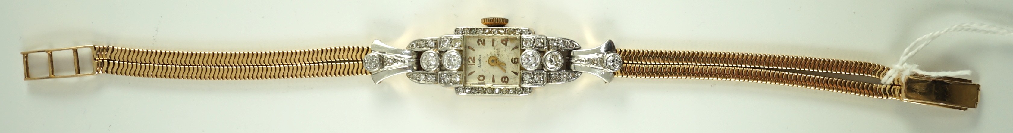 A mid to late 20th century gold and diamond set Eska manual wind cocktail watch